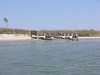 SundownIsland > This is the view as you first approach Sundown Island--the windmill and the dock, now sanded in from the dredging projected. (Photo credit: Steve Tripp)