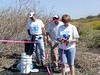 SundownIsland > Richard, Steve and Barbara mark off the new tree plot with pink tape. (Photo credit: Hannah Olson)