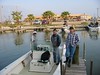 SundownIsland > Ron Arlitt and son Matthew and Petra Hockey are waiting for the group to head out to the island.