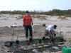 SundownIsland > Jim Schuelke lends Brenda Eskelson a hand with the second test plot.  (photo by Steve Tripp)