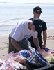 SundownIsland > Devon's Jim Schuelke and Chris Bouley help themselves to lunch.  (photo by Steve Tripp)