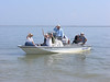 SundownIsland > Devon volunteers leave the island after a day well-spent.  (photo by Steve Tripp)