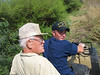 SundownIsland > Chris Bouley takes Warden Chester Smith for a spin  on the four wheeler to survey the island.
