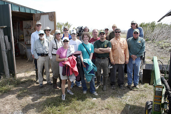 SundownIsland > Volunteers (L to R): Back row: Ed Taylor, Mark Elwonger, Tim Wilkinson, Abe Moore, Doug Wilkinson; Middle: Larry Tisdel, Diane Nunley, Tyler Wilkinson, Richard Prater, Ethan Vuichard, Kyle Haley; Front: Peggy Wilkinson, Hannah Olson, Niell Irvin, Jeremey Cecil, Rob Muir. This is not all of the volunteers.  It is the group I captured before we all left for the boats.  (Photo credit: Marcy Spears)