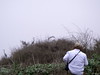 SundownIsland > Randy Schoen observes a group of Great-blue Herons preparing their nests. Photo credit: Andrew C. Kasner
