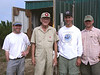 SundownIsland > Pictured in front of the tractor shed are David Newstead, Chester Smith, Andy Kasner, Jason Hardin. Photo credit: Andrew C. Kasner