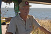 SundownIsland > Well, first things first.  Chester Smith, warden of Sundown Island brought the tractor to the dock to pick up supplies to haul to the shed. Photo credit: Marcy Crowe Spears