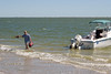 SundownIsland > Finally, Tim Wilkinson arrives with the last two volunteers (Jennifer and Jarrod) and the battery.  Be sure to ask them about their adventures getting to the island.  Photo credit: Marcy Crowe Spears