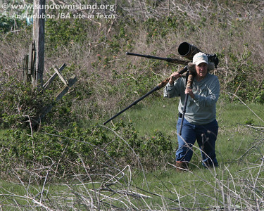 Diane Nunley has been taken photos of the large birds in the Pelican Estates 2.  She is walking towards the platform that has an observation deck on the top. Notice how long and lush the grass is.

Photo credit: Marcy Spears