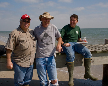 Able De Leon, Gregg and Eric Giggleman, on the dock, enjoying a break from work.
Photo credit: Marcy Spears